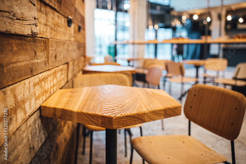 Close up view on empty wooden coffee shop tables
