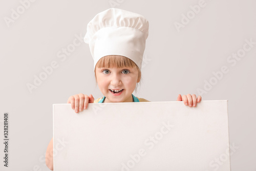 Cute little chef with blank...