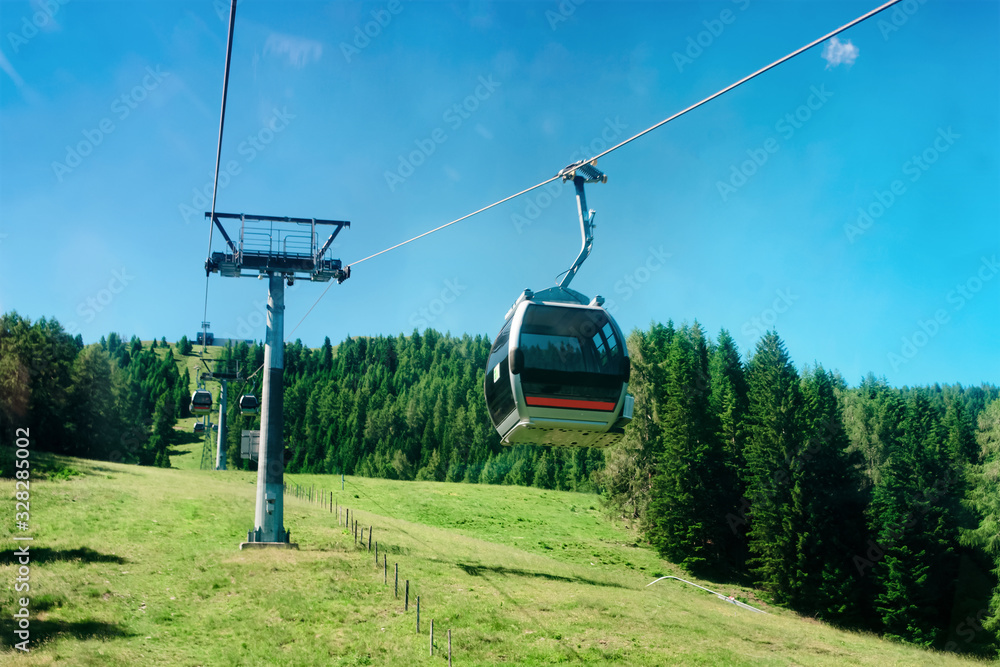 Panoramic view with cable cars in mountain and blue sky at Bad Kleinkirchheim of Austria