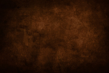 dark brown stained grungy background or texture