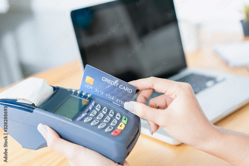Credit card phone Technology, Online shopping, Digital banking at home lifestyle, a beautiful Smiling Asian woman press card number on a smartphone for business payment, career, e-commerce trading Credit card phone Technology, Online shopping, Digital banking at home lifestyle, a beautiful Smiling Asian woman press card number on a smartphone for business payment, career, e-commerce trading