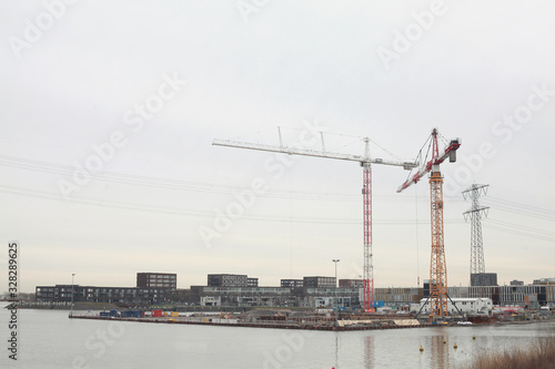 Construction of new luxury house on a water in Amsterdam
