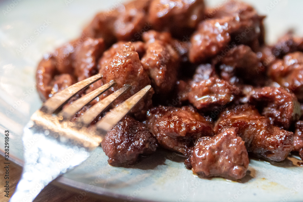 The process of cooking beef