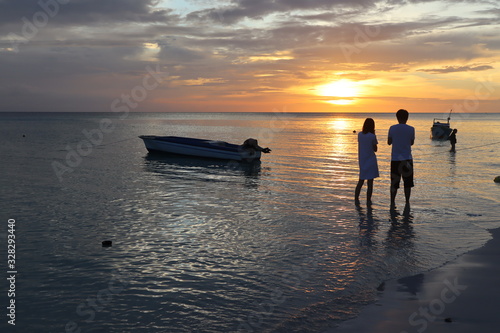 Romantic couple with a boat