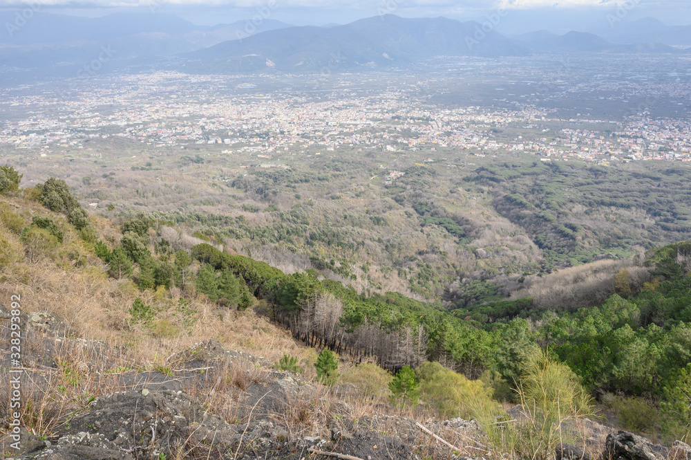 Naples, Italy - March 2020 A team of people trekking on the mountain close to Vesuvius Volcano to discover the beauty of nature and sense of a team. Naples, Italy - March 2020 A team of people trekking on the mountain close to Vesuvius Volcano to discover the beauty of nature and sense of a team.