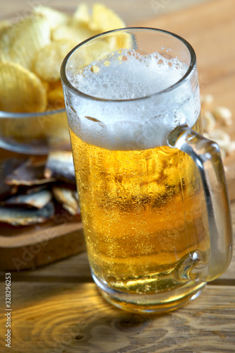 beer and snacks on a light background