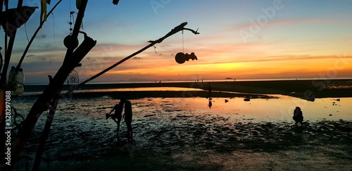 fishing at sunset