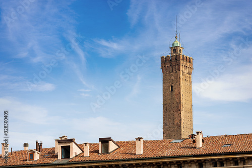 Torre degli Asinelli. One of the two towers (Due Torri 1109-1119, 97.20 meters high) symbol of the city of Bologna, Piazza di Porta Ravegnana, Emilia-Romagna, Italy, Europe photo