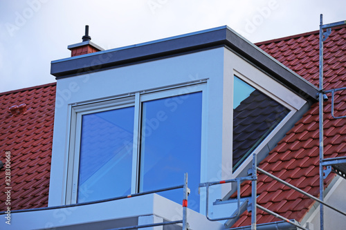 High quality dormer with additional side windows photo