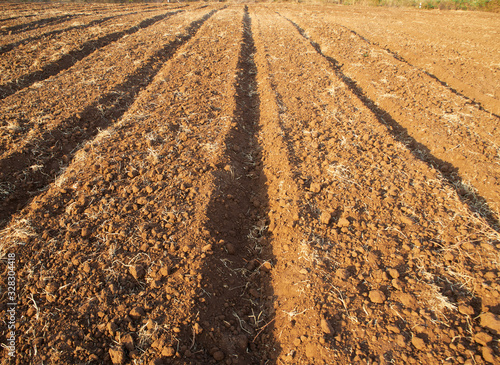 фотографія Agricultural soil preparation for cultivation.