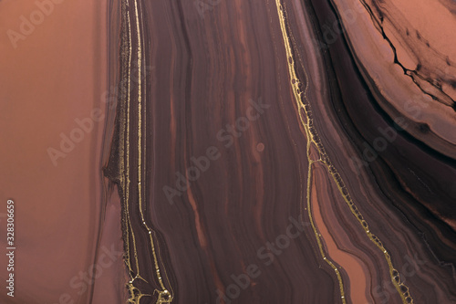 Abstract brown waves are like cut of stone. Art Deco marbling background or texture. Acrylic Fluid Art photo