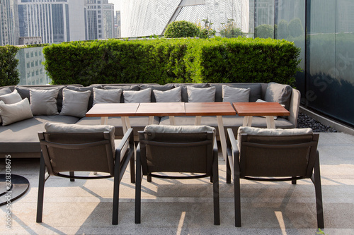 Modern Sofa and furniture on rooftop garden. photo