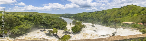 Panoramic view of the Binga waterfalls on Keve river, tropical banks landscape