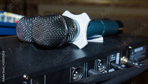 two black microphones on the amplifier © Gegham