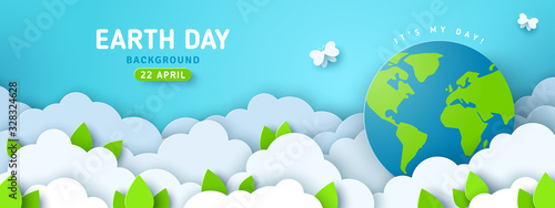 Plakat Earth Day banner or poster with paper cut clouds in blue sky. Background with green leaves, butterfly and globe. Vector illustration. Place for text.