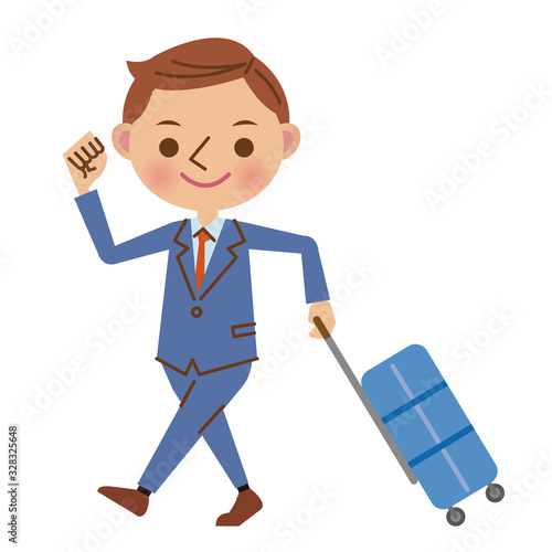 スーツケースを引いて歩くビジネスマン