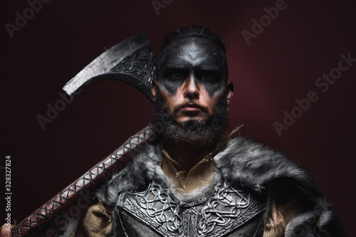 Quadro su tela portrait of a Viking man with an axe