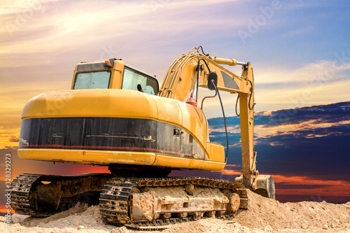 excavator on the beach