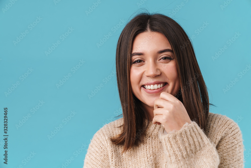 Image of happy caucasian woman laughing and looking at camera Image of happy caucasian woman laughing and looking at camera
