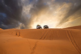 A beautiful view of the cars in the desert