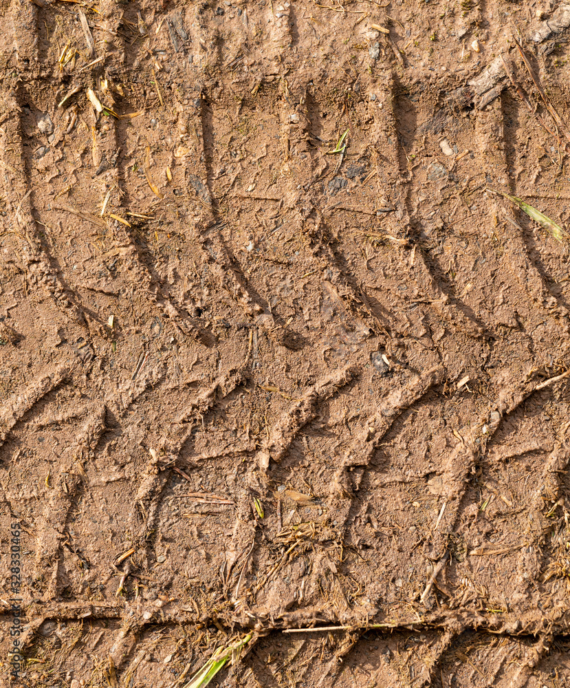 texture of car tire trail in mud texture of car tire trail in mud