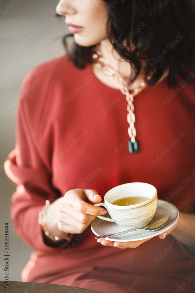Young business lady with luxury accessories in cafe Young business lady with luxury accessories in cafe