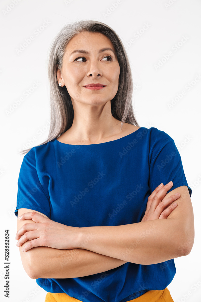 Image of adult woman with long gray hair looking aside at empty space