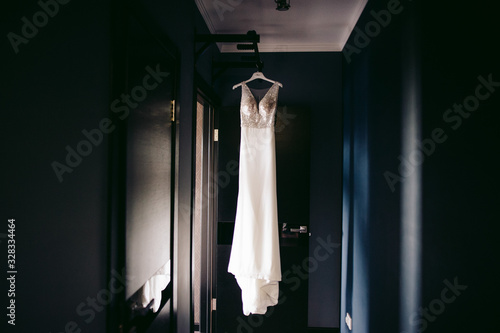 Gorgeous wedding dress on a hanger