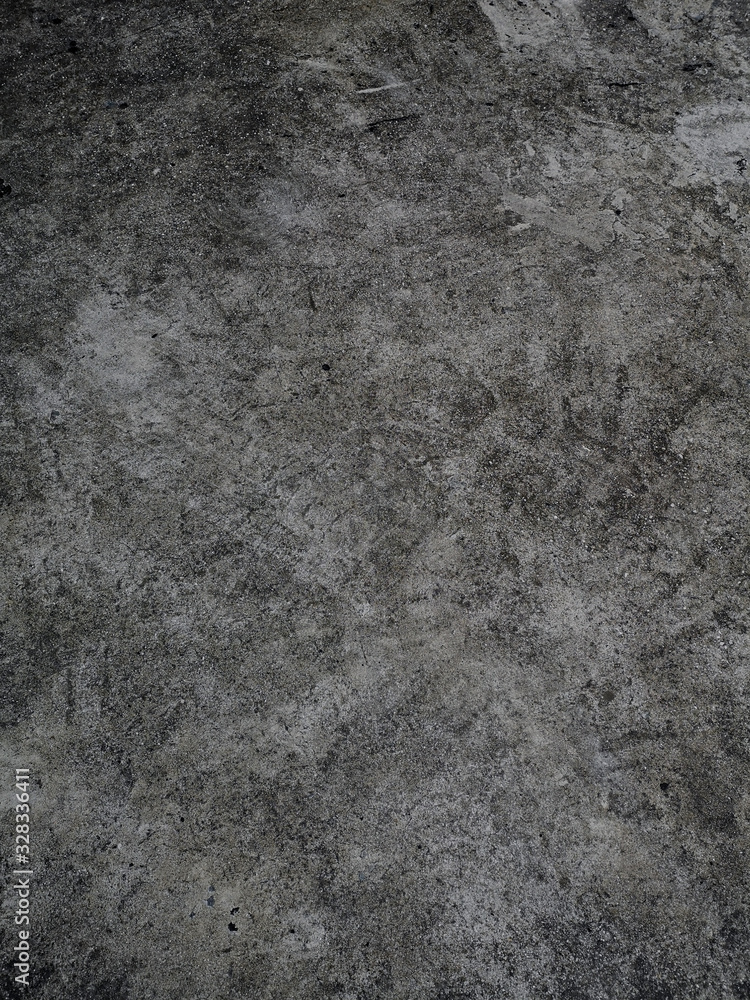 Naklejka premium Rough dark grey concrete wall background
