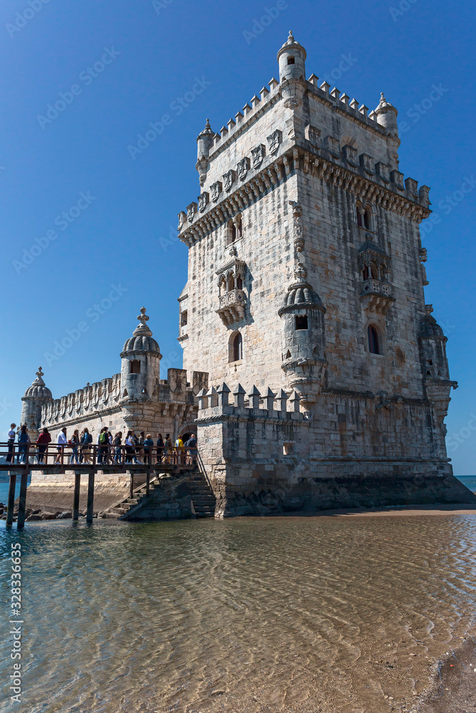 Fortress Torre de Belem - on the island in the Tagus river, a favorite place for tourists from different countries