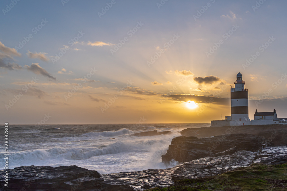 Hook Lighthouse at sunset, the worlds oldest lighthouse is located in the south east of Ireland in Co Wexford.