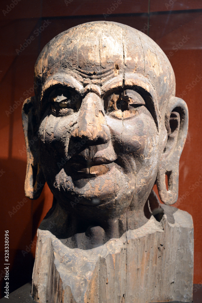 Close up of Bodhisattva statue head in Chinese Buddhist temple