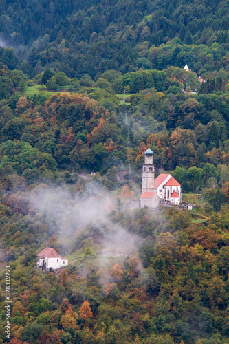 vista nebbiosa della pieve di san pietro photo