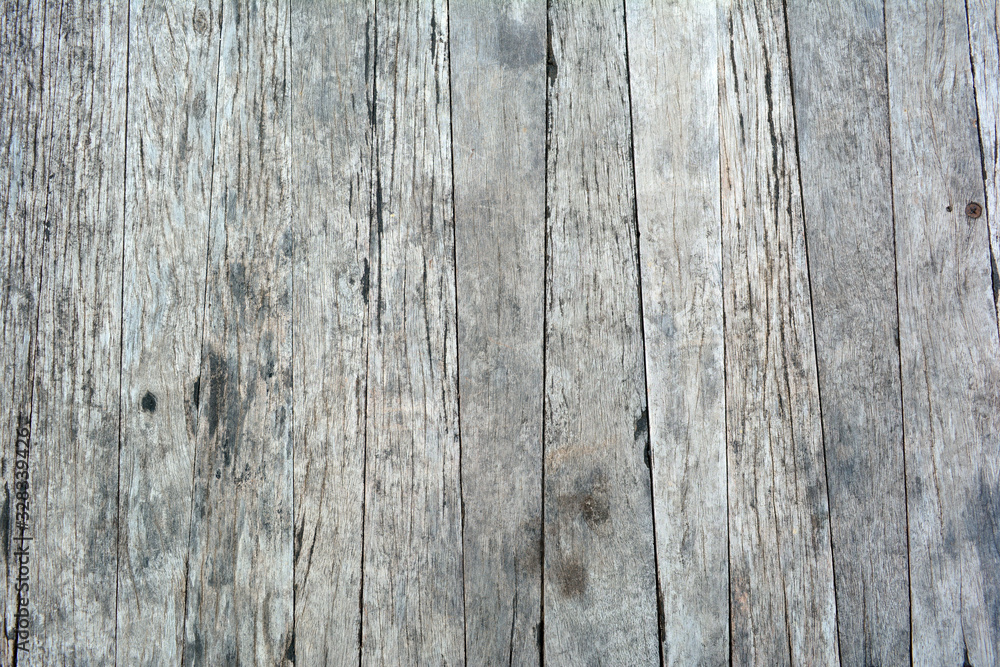 the background of old wood table with dirty stain on wooden surface the background of old wood table with dirty stain on wooden surface