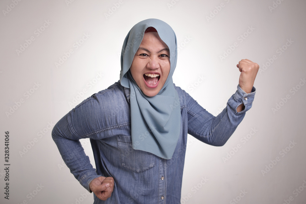 Muslim Lady Shows Strong Muscle Gesture Muslim Lady Shows Strong Muscle Gesture