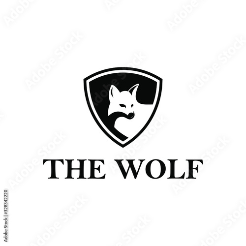 Fototapeta creative wolf vector with shield protection logo design
