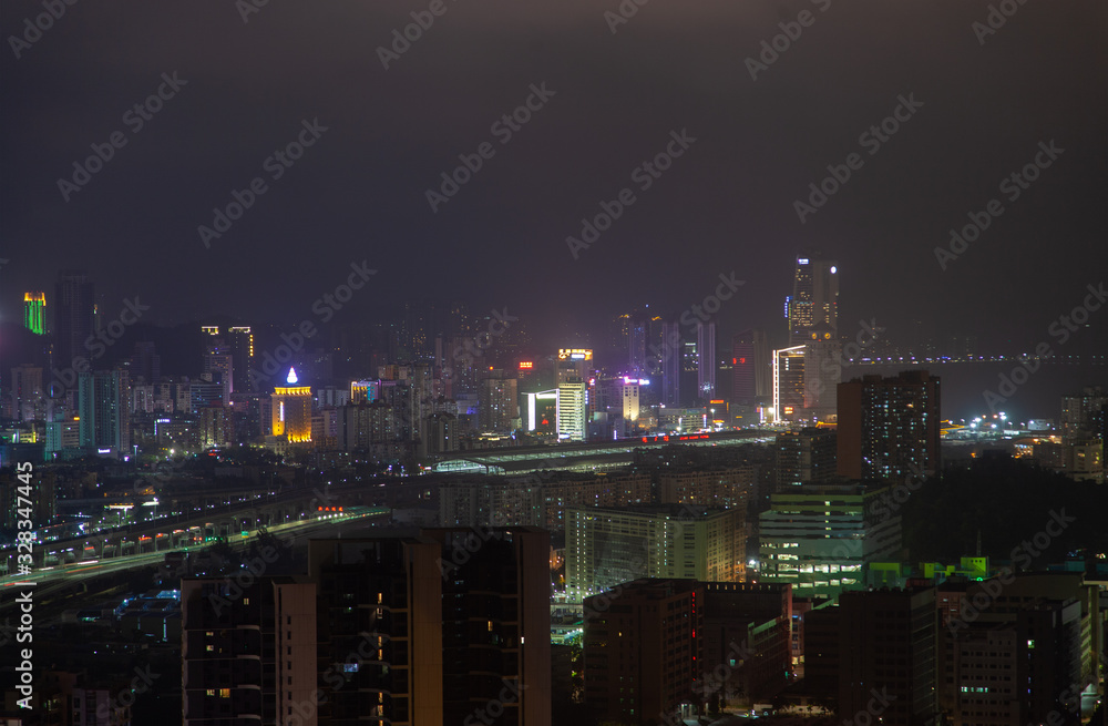 Night Macao and Zhuhai on Portas do Cerco in China 