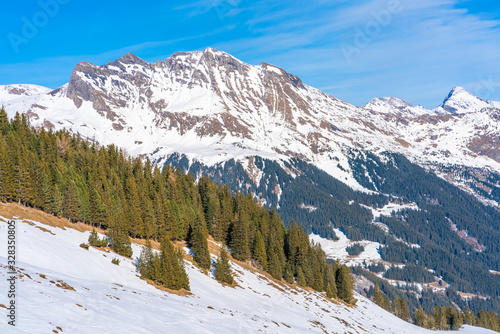 Winter landscape with snow Swiss Alps from Mannlichen mountain in Grindelwald ski resort. Winter in Switzerland © beataaldridge