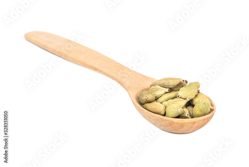 Green cardamom in spoon