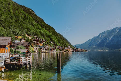 Scenic picture - postcard view of famous tourist historic attraction Hallstatt, UNESCO mountain village in the Austrian Alps at beautiful light in summer, Salzkammergut region, Hallstatt, Austria