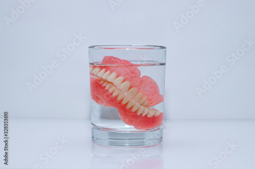 False jaw in a glass of water.