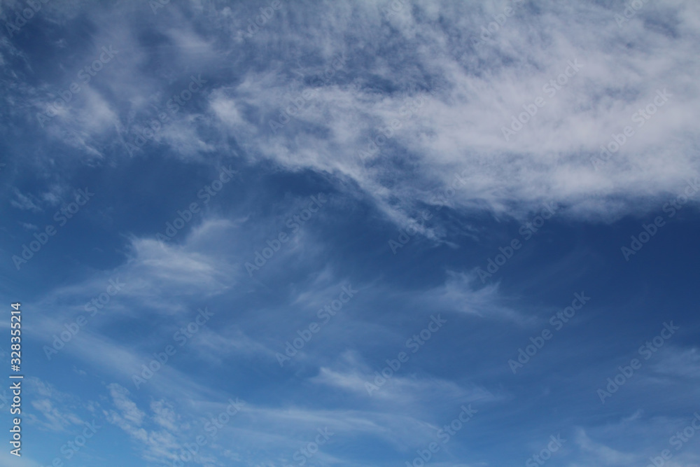 The vast blue sky and clouds sky. blue sky background with tiny clouds. blue sky panorama. 