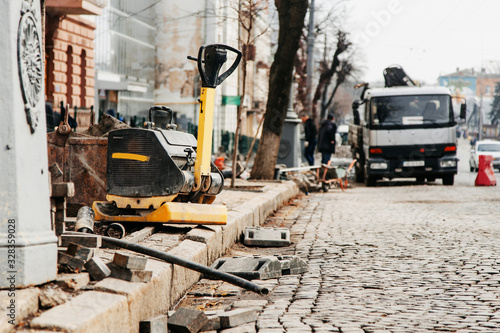 repair of the sidewalk in the city