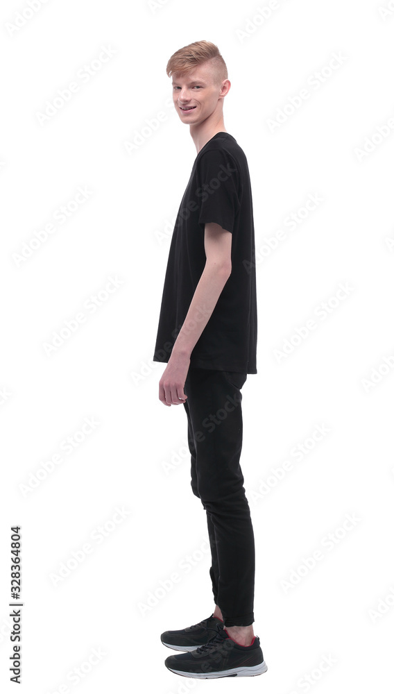 side view. casual student guy looking forward.