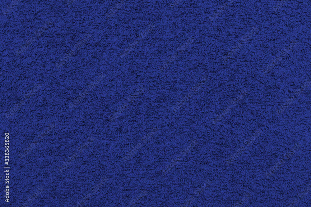 The texture of a classic blue wool towel. The texture of a classic blue wool towel.