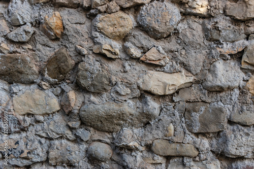 A close-up shot of a traditional medieval stone wall