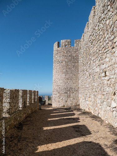 castle tower in sanciago de cacem in portugal photo