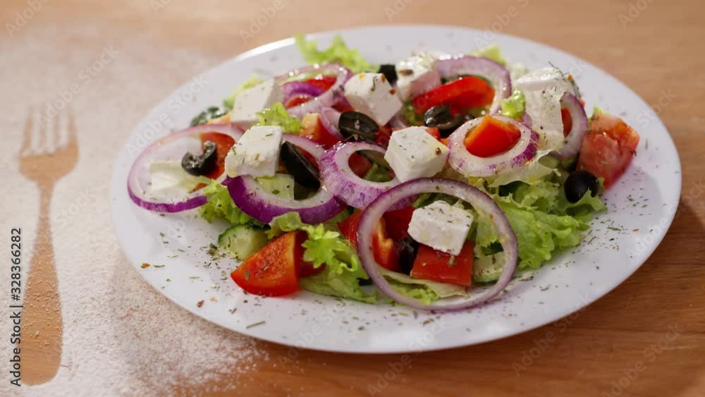 Close up view of greek salad for healthy eating fresh vegetables with feta cheese onion served in restaurant vegetarian ingredient green summer appetizer lettuce healthy tomato cucumber cuisine olive Close up view of greek salad for healthy eating fresh vegetables with feta cheese onion served in restaurant vegetarian ingredient green summer appetizer lettuce healthy tomato cucumber cuisine olive