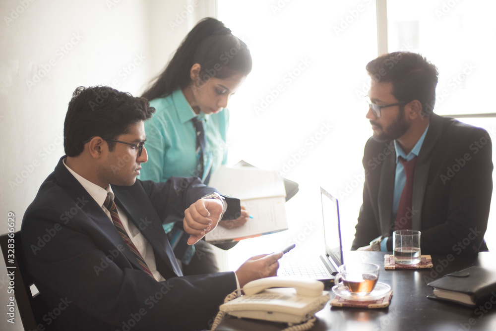 Corporate meetings between young and energetic Indian Bengali bosses/officers/managers and secretary. Indian corporate lifestyle Corporate meetings between young and energetic Indian Bengali bosses/officers/managers and secretary. Indian corporate lifestyle