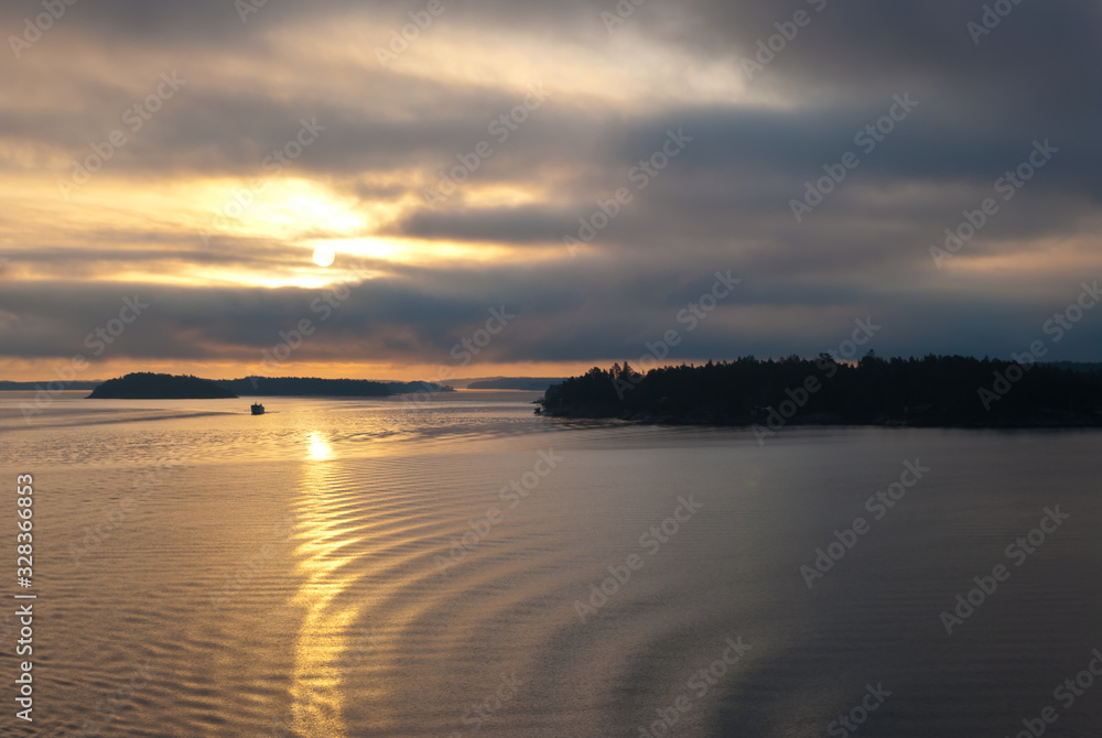 small ships off the Islands of Scandinavia Sweden early in the morning the Baltic sea